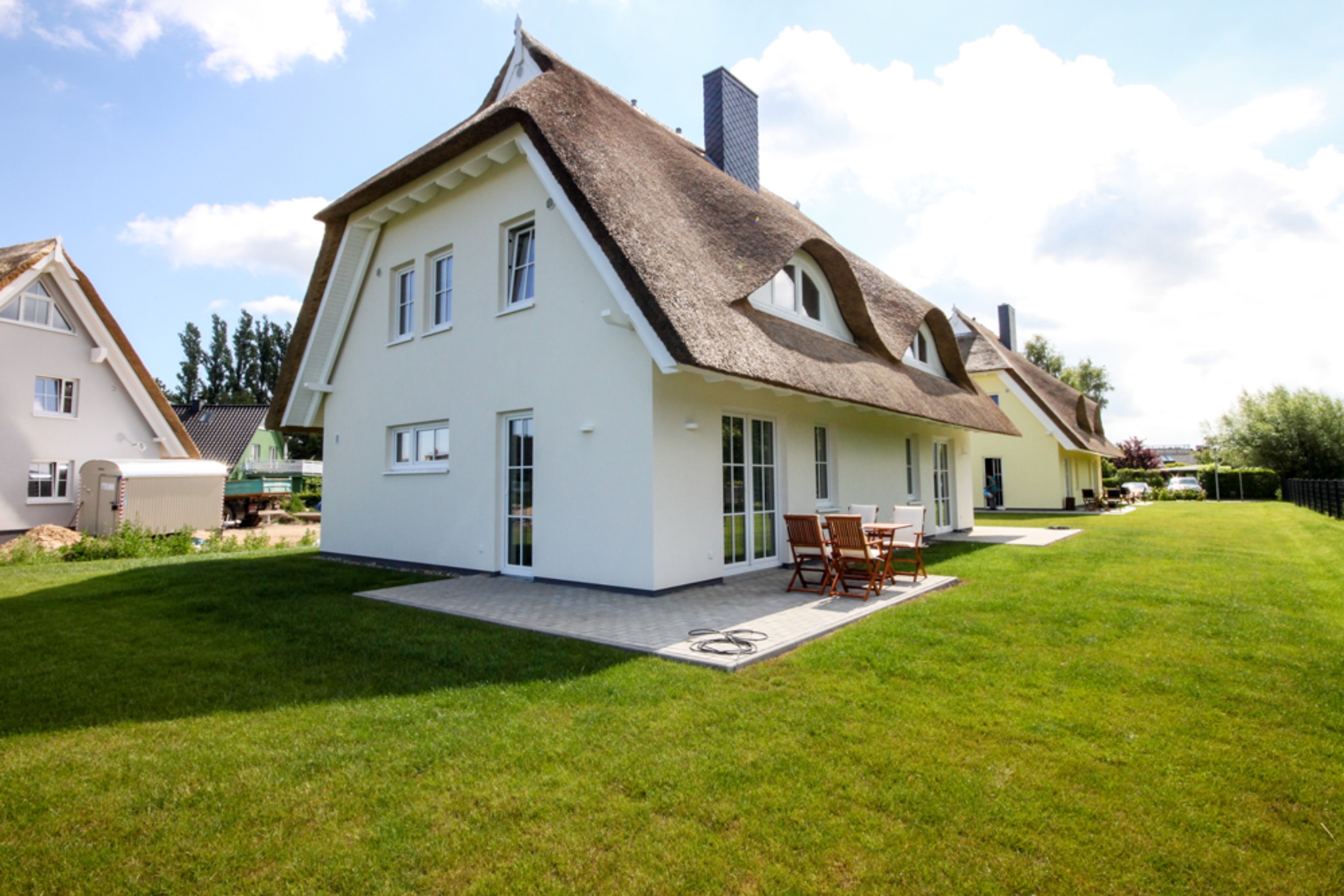 Reetdachhaus Strandweg 71, Ferienwohnungen in Börgerende